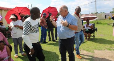 Two men have intense discussion outside