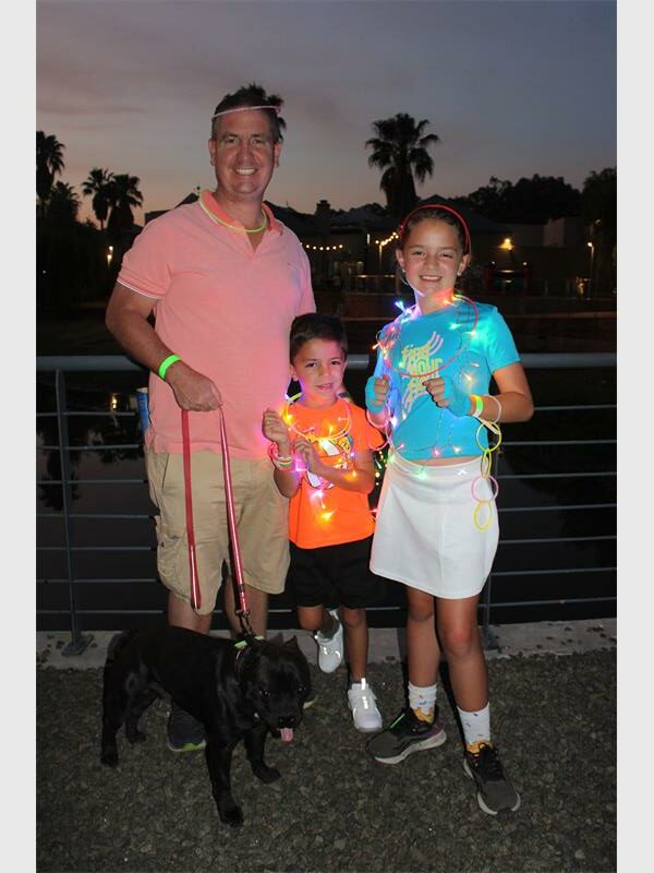 a father, two children and a dog