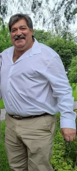 big man in white shirt