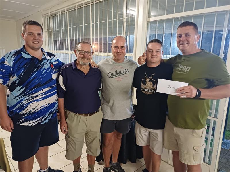 Five people with an envelope