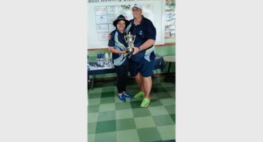 woman and man with trophy