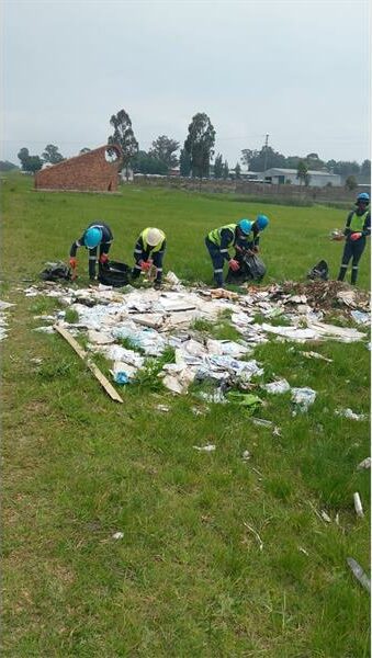 people picking up trash