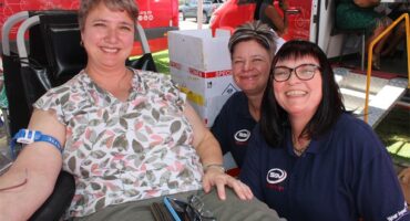 women at blood donation drive