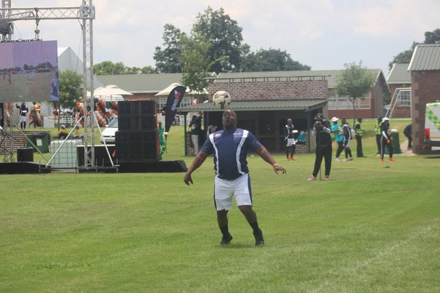 Head office player headbutts the ball.