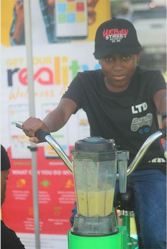 boy pedals to make a smoothie