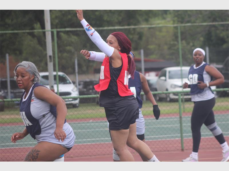A Seriti New Vaal player jumps to catch the ball.