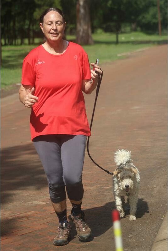 woman with a puppy outside