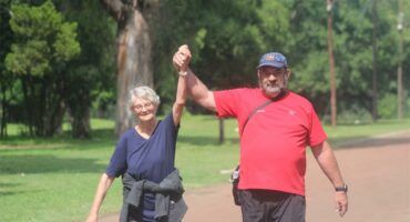 Parkrunners enter the end point triumphantly.