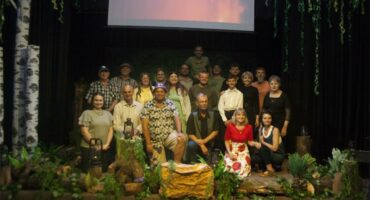 a group of people on a stage