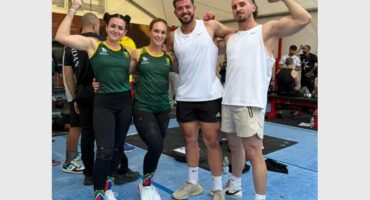 2 women and two men in gym clothes