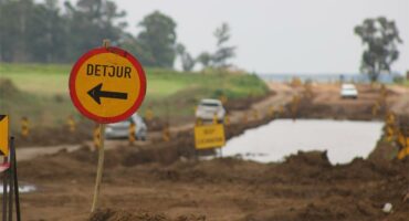 a detour sign in the road