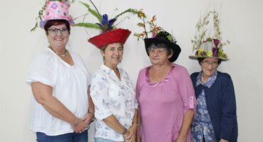 women with flower hats
