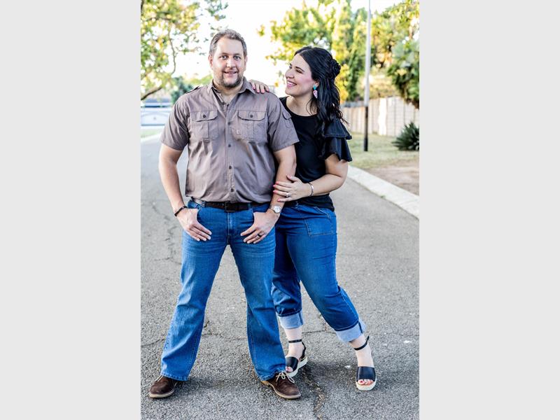 couple poses in denim