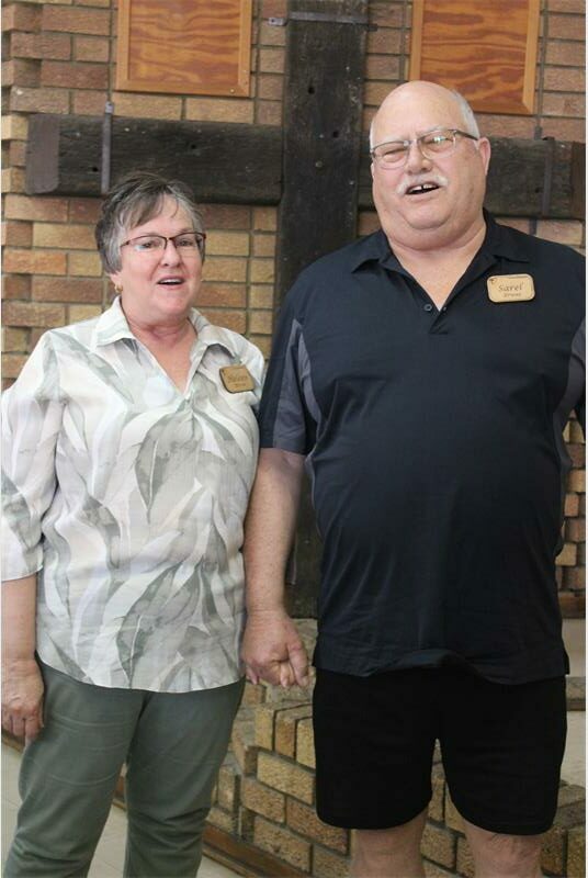 couple hold hands