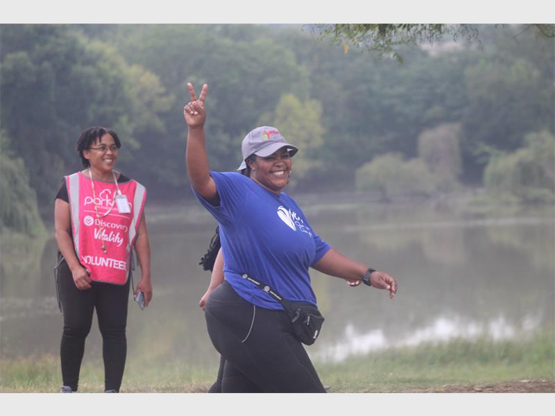 woman shows peace sign