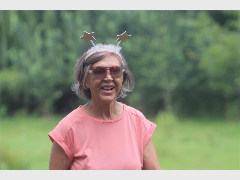 woman with stars above her head