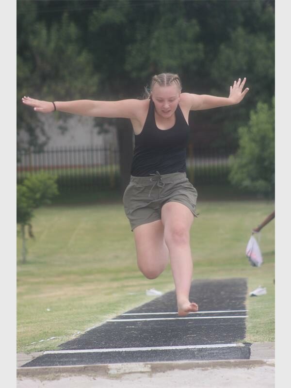 girl jumps far