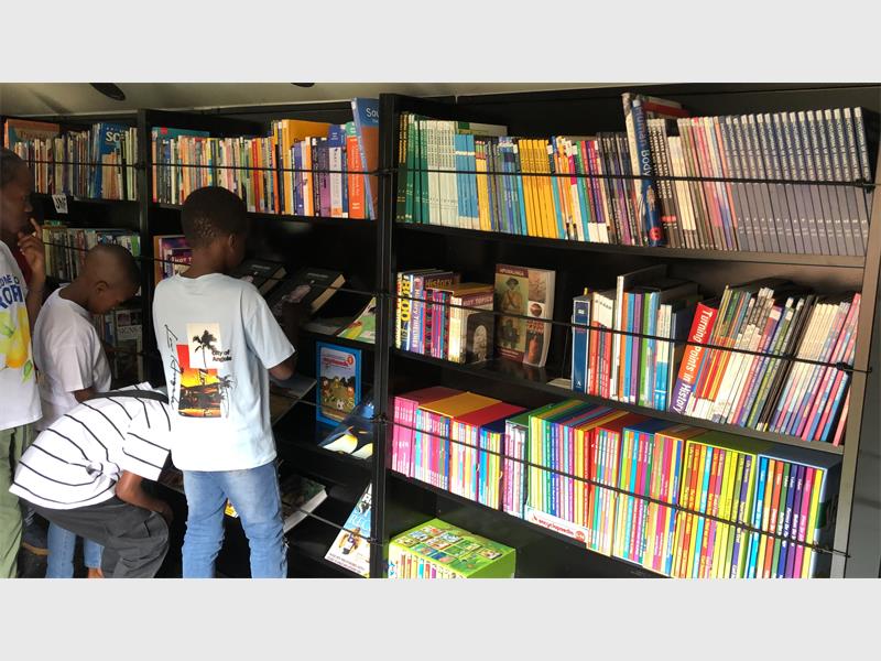 Children browsing books.