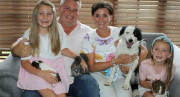 a family with their dog