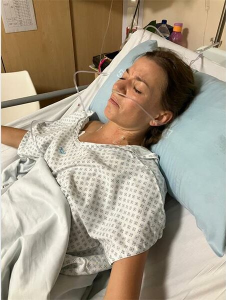 A woman in a hospital bed
