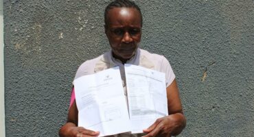 woman with two documents