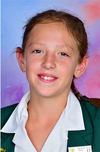school girl with a green blazer