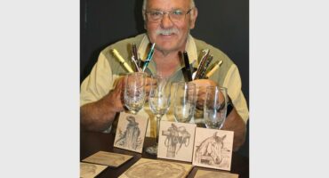 man with wooden objects