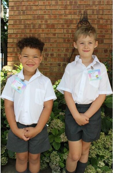two little boys in school uniforms
