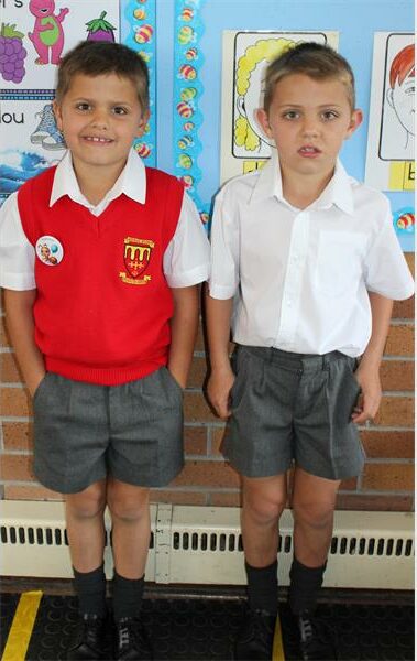 two boys in school uniform