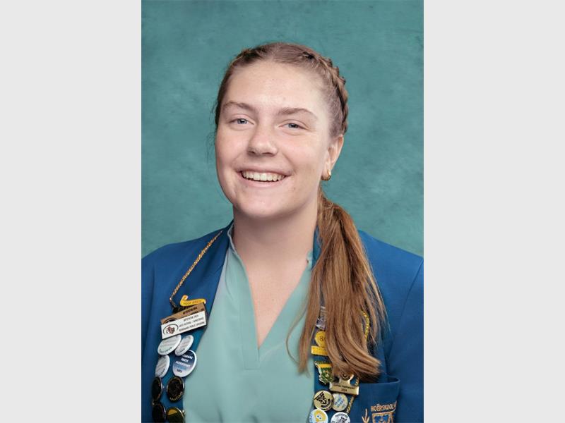 girl with pony tail and school uniform