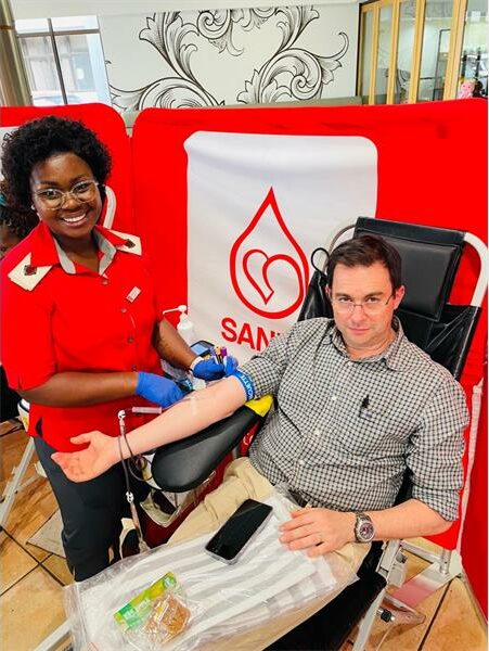 man donates blood