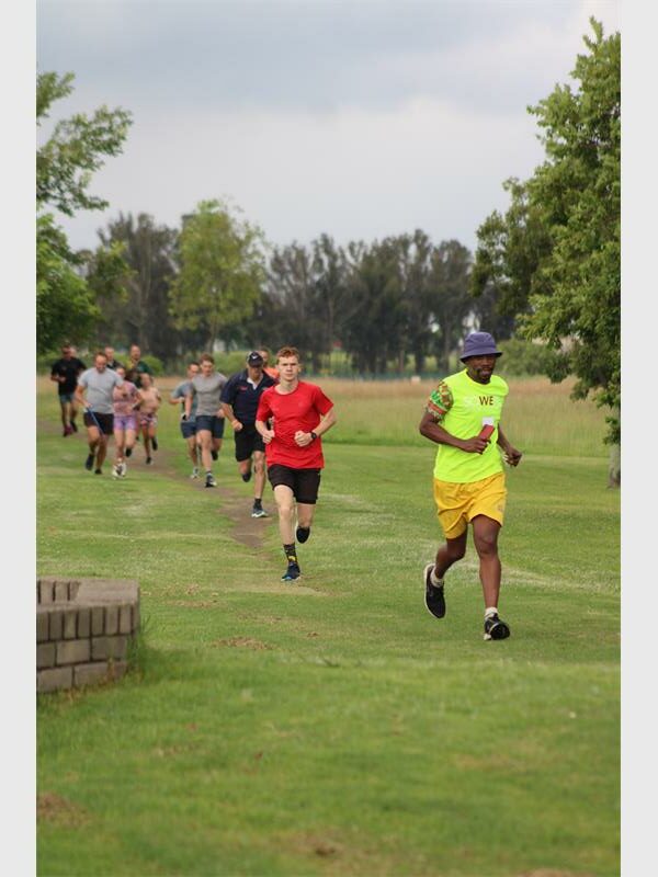 people running in a park