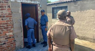 law enforcers visit a house
