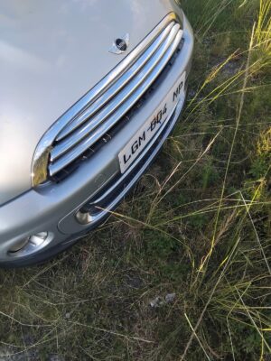 mini cooper logo on silver car