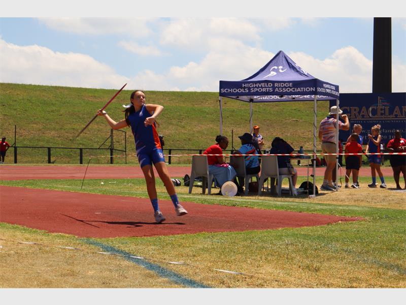 and athlete about to release a javelin