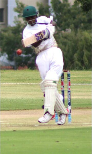 a batsman in white