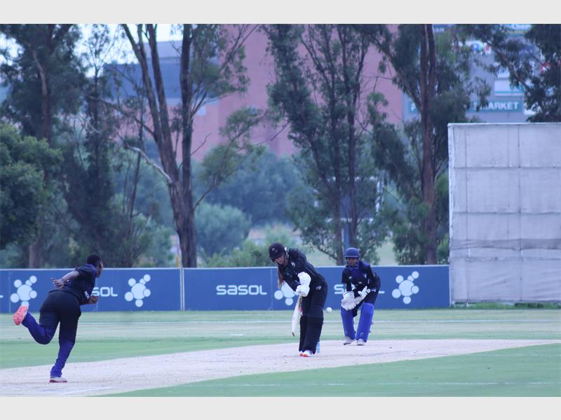 a batsman stops the ball on the pitch
