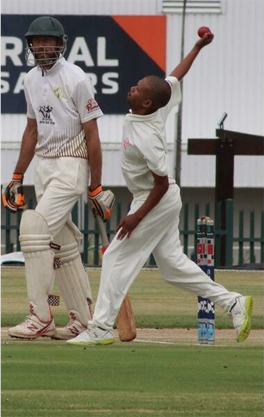 a cricket player bowls