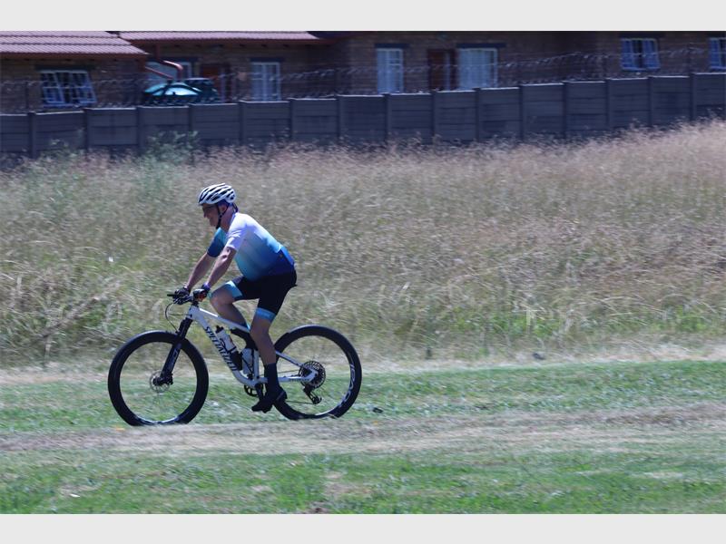 a cyclist in the field