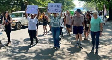 people picket with posters