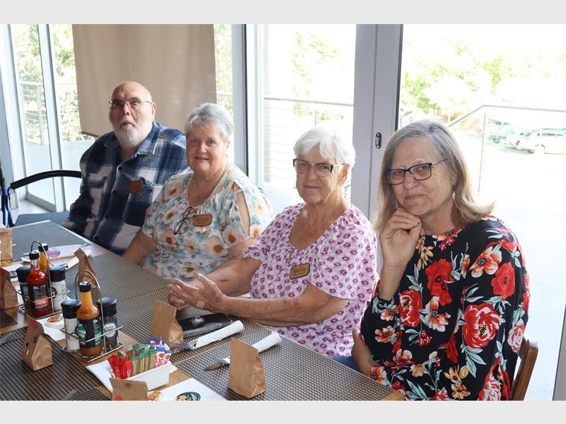 elderly people at a table