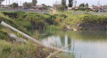 water pond with water ducts from sewage plant.