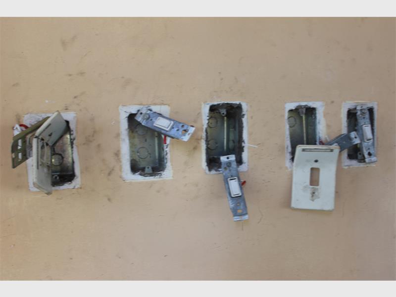 electrical plugs stripped from the wall