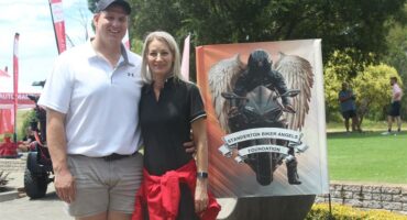 two people at the golf course