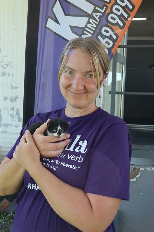 a blonde woman with a puppy