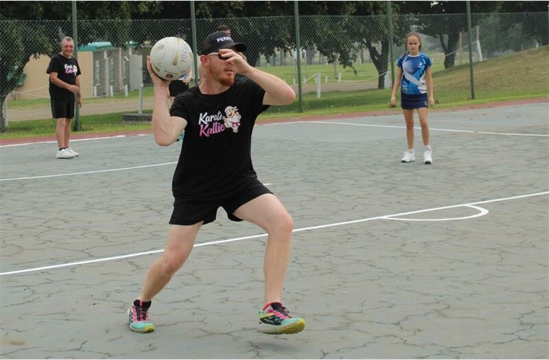 man with netball ball
