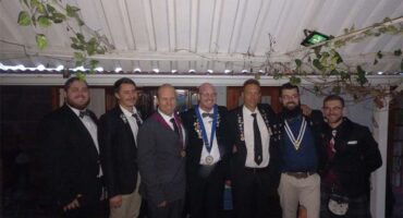 a group of men in suits