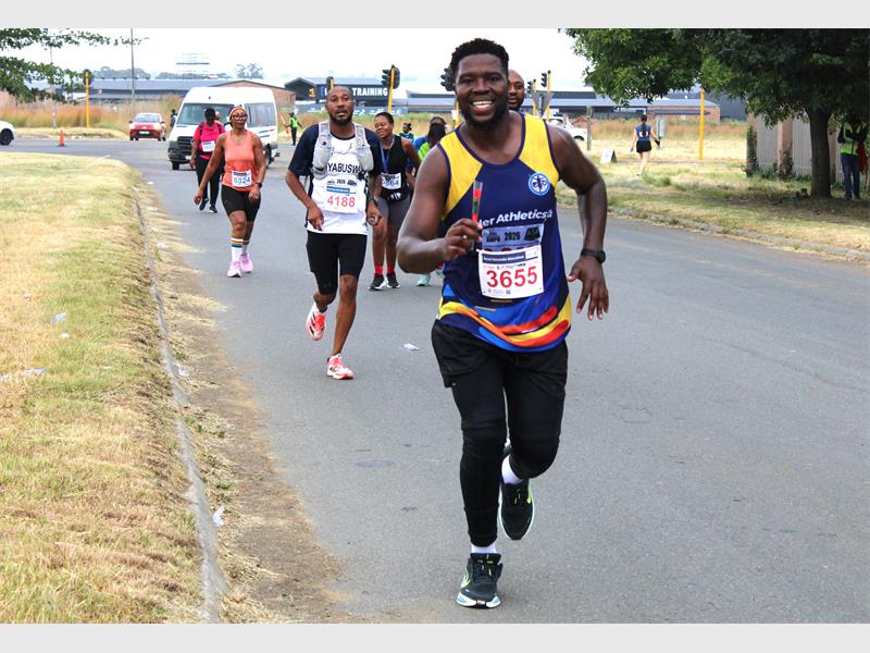 runners take part in a road race