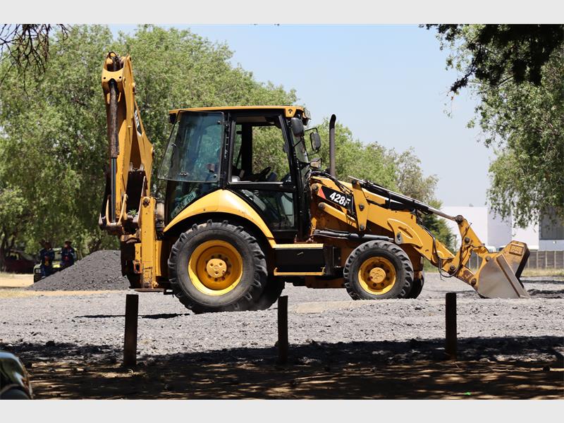 heavy machinery at in parking lot