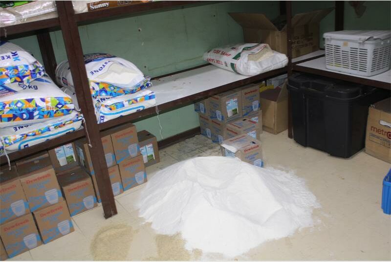 maize meal spilled onto the floor